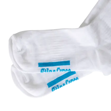 atlas copco logo in arch of the foot