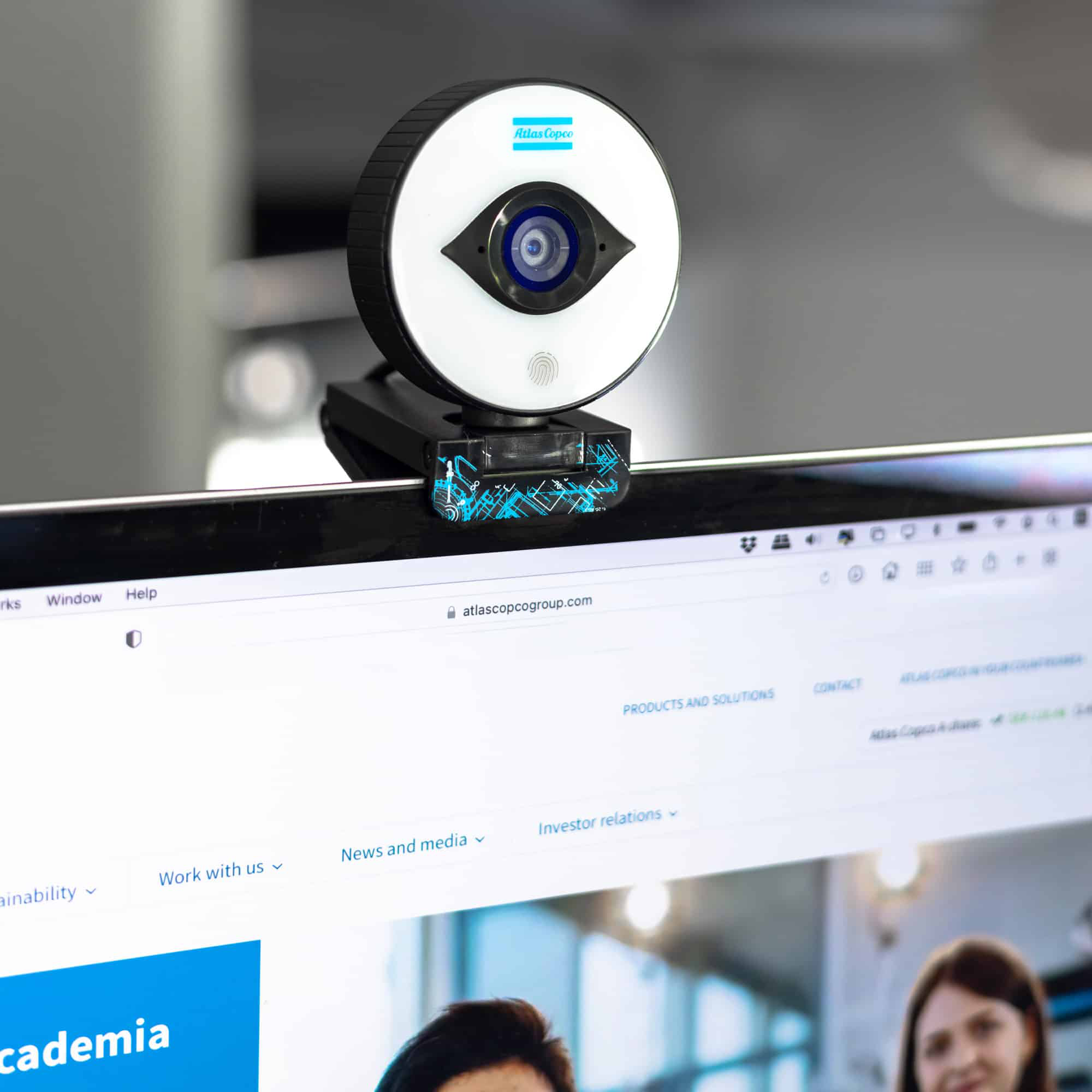 webcam with blue atlas copco logo