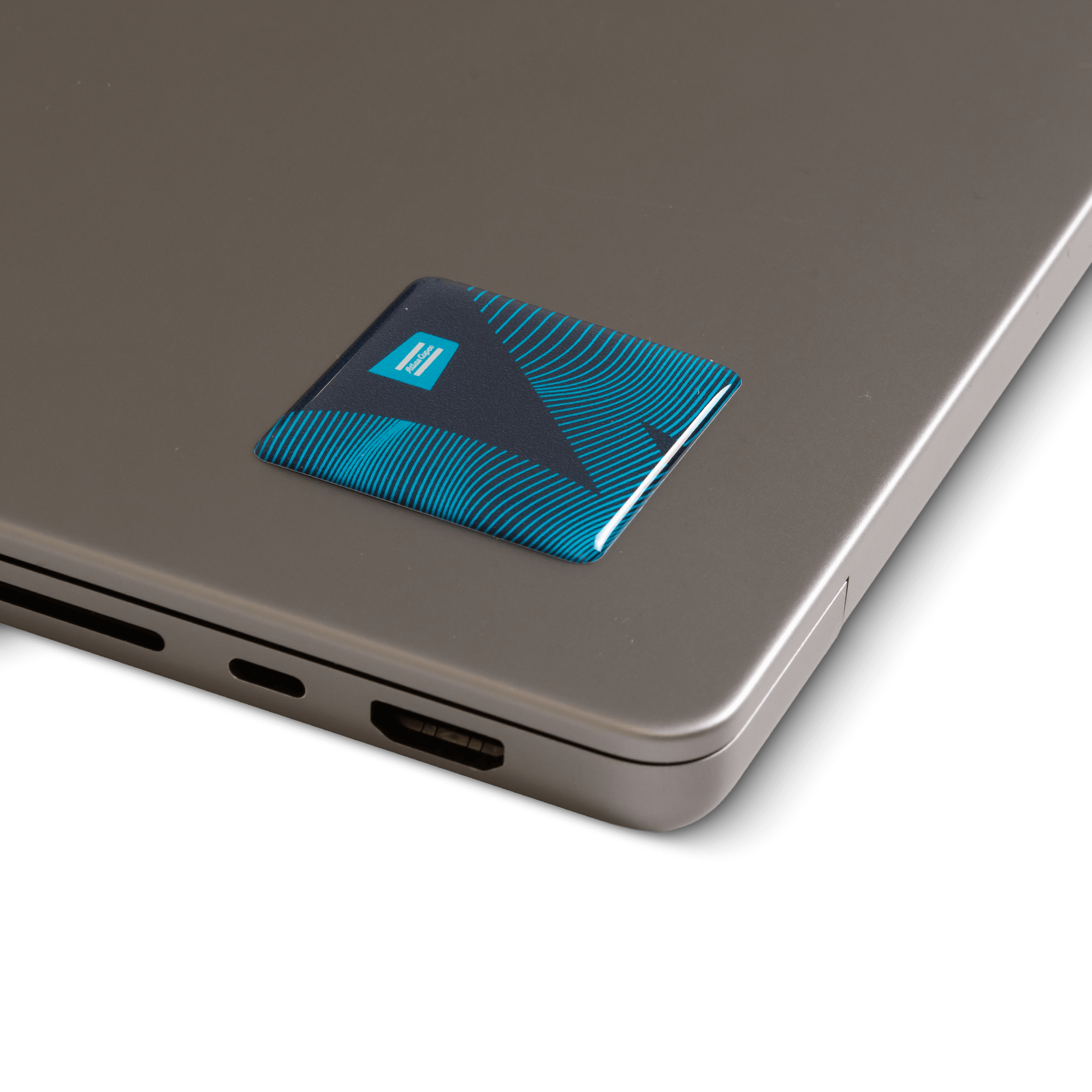 Atlas copco stickers with level up the experience text and graphics on laptop