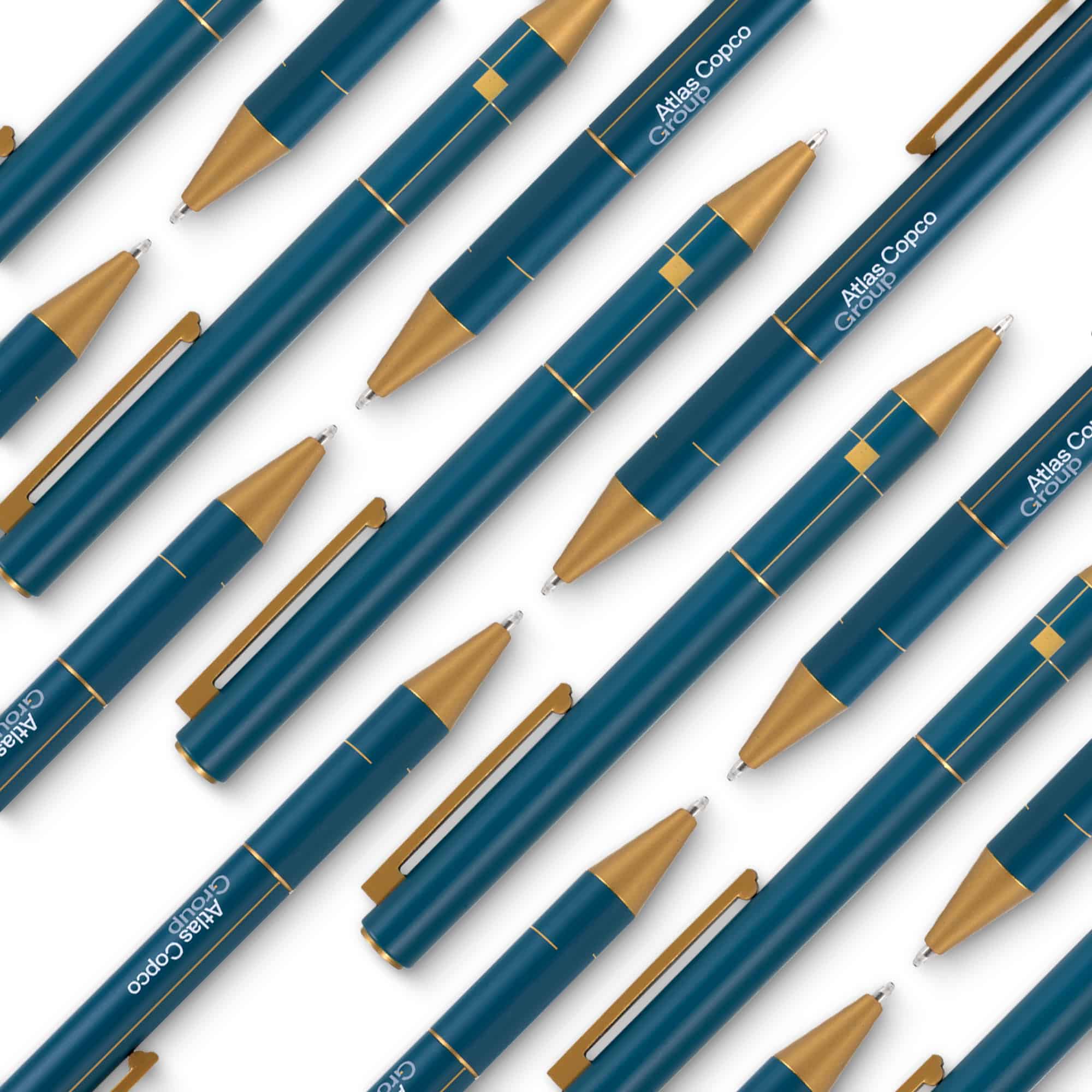atlas copco group pen in teal and gold