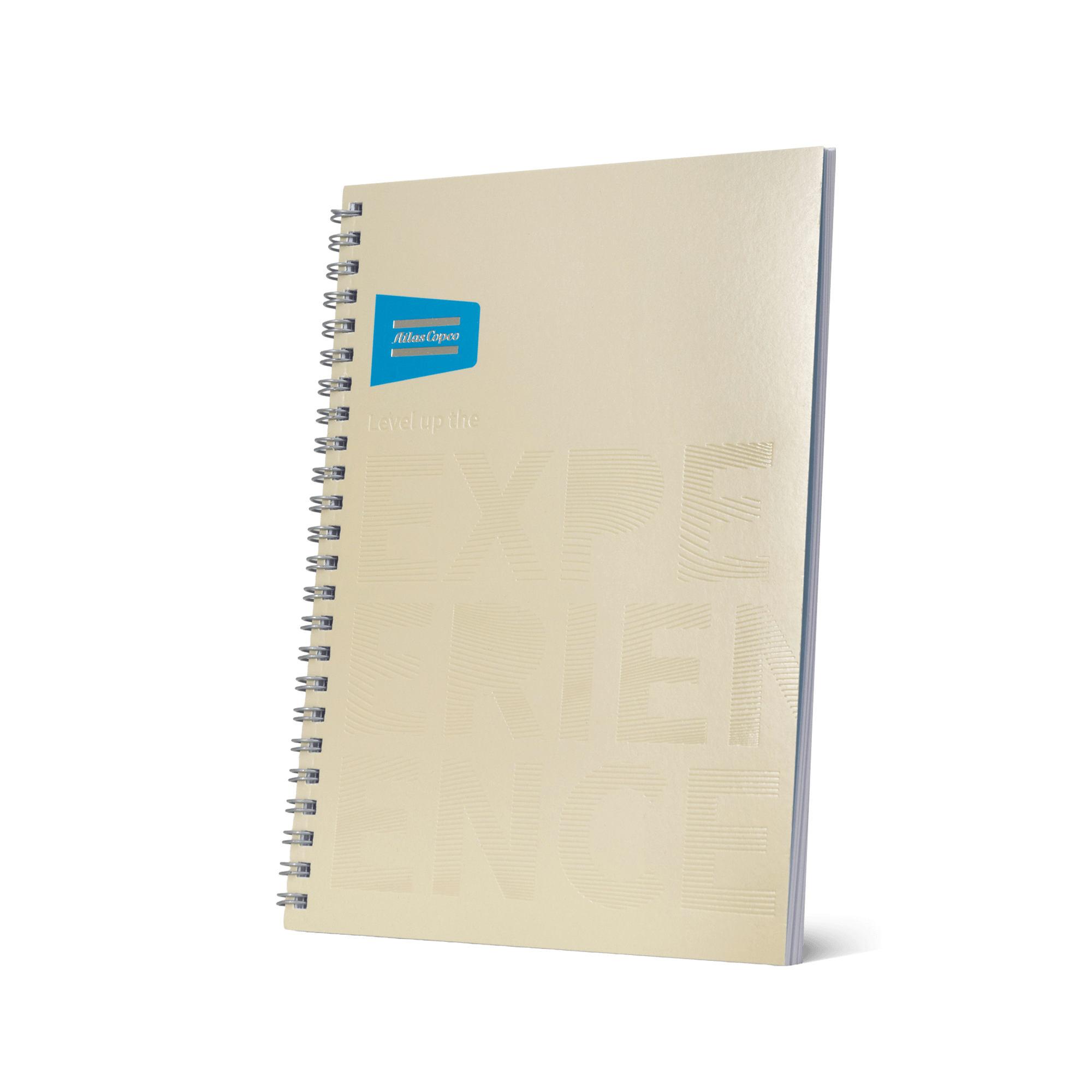 beige notebook with atlas copco logo and brand promise in beige embossed text